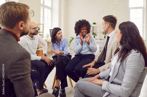 Obraz na płótnie Coach or group leader telling funny, scary story, joke to amuse, teach diverse t