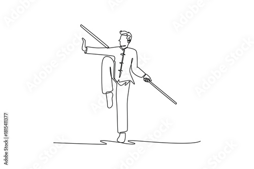 Single one line drawing man Wushu athlete balancing on one leg, holding staff horizontally. Precision, control, and grace of martial arts form. Continuous line draw design graphic vector illustration