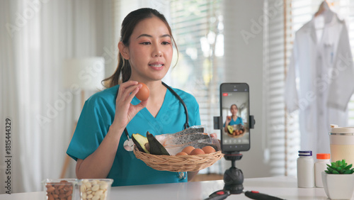 Asia woman people anti aging expert modern health care vlogger live advice talk selfie video mobile phone camera. Online diet food weight loss HDL meal plan recipe digital virtual asian coach filming.