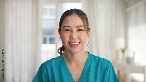 Young adult woman asia people anti aging expert modern nurse happy smile worker live home video call screen selfie look at camera mental health care Online digital virtual asian tele consult clinic.