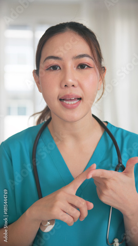 POV Young adult woman asia people anti aging expert modern nurse live talk video call selfie look at camera mobile phone app mental health care Online side hustle digital virtual asian vlogger filming