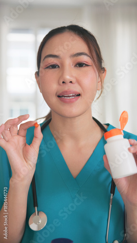 POV Asia woman people anti aging expert modern health care live advice talk selfie video phone call look at camera. Online retail diet weight loss digital virtual asian filming vitamin pill drug store