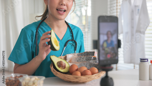 Asia woman people anti aging expert modern health care vlogger live advice talk selfie video mobile phone camera. Online diet food weight loss HDL meal plan recipe digital virtual asian coach filming.