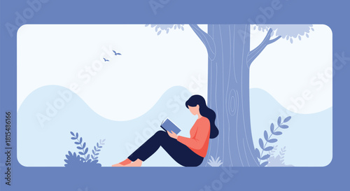 Young woman sits under a large tree and reads a book in a peaceful outdoor setting.
