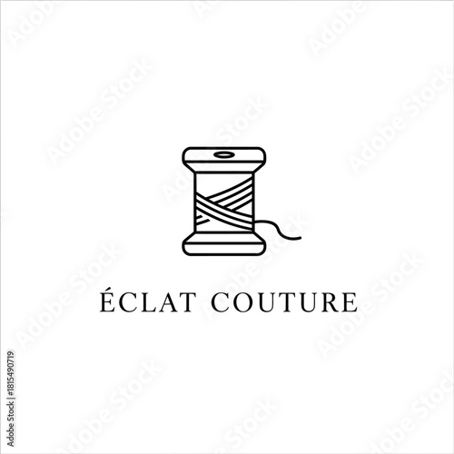 Elegant line art logo of a thread spool for a couture brand.