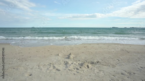 seascape landscape background by sea sand beach or island with motion little waves and nature blue sky daylight to horizon for summer holiday travel with sand mountain to nobody at rayong in thailand