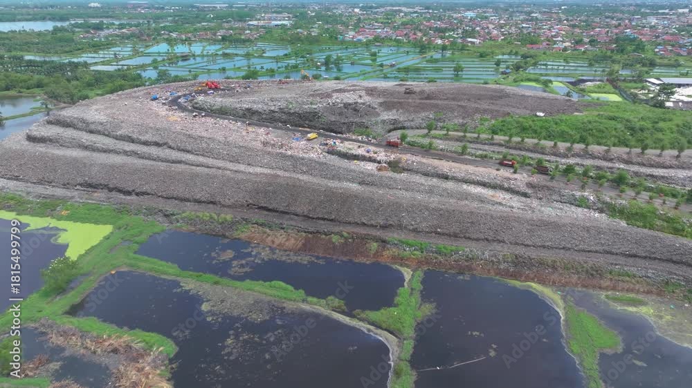 custom made wallpaper toronto digital Aerial footage of a landfill in Medan, showcasing heavy machinery managing and organizing waste efficiently