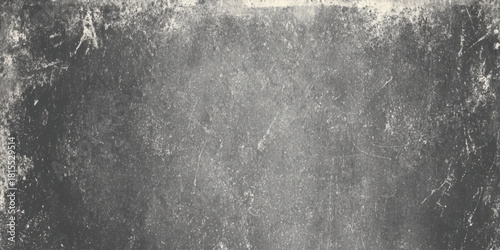 Dark grunge metal texture with scratches and gradient light old distressed concrete wall background banner.