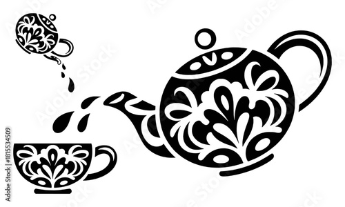 Black and white ornate teapot pouring tea into a decorative cup
