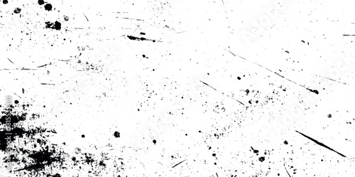 Abstract grunge texture featuring dynamic black ink splatters, scratches, and distressed marks on a clean white background.