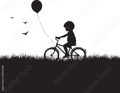 silhouette of a child riding bicycle with balloon