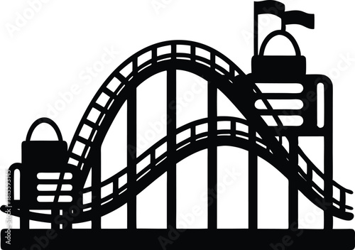 Silhouette of a classic wooden roller coaster peak