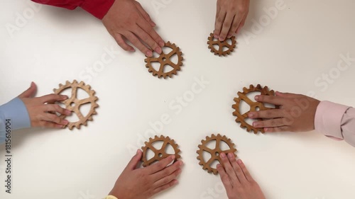 Panorama video of employee together connect wooden cogwheel gear symbol harmonious function productive system in business company and synergy teamwork with effective and efficiency working. Synergic