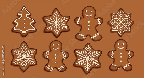 A collection of festive gingerbread cookies decorated with white icing, including gingerbread men, snowflakes, and a Christmas tree.