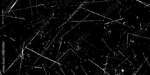 Abstract black and white grunge dust particle and dust grain texture. old grunge texture with scratches and cracks paint wall texture. dust overlay distress grain with scratch grunge urban background.