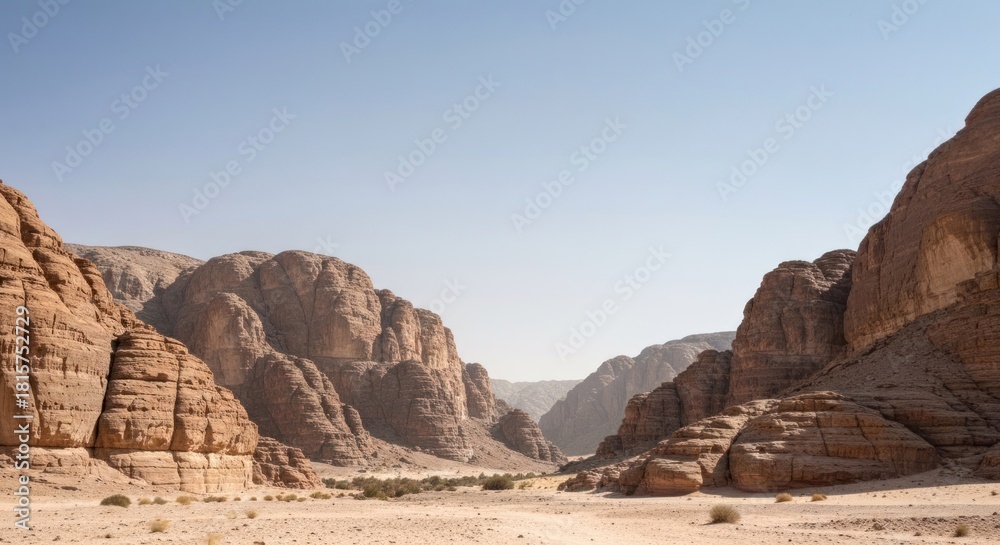 Fototapeta premium Desert canyon vista under a pale blue sky