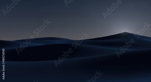 Dark, undulating sand dunes silhouetted against a dim, twilight sky