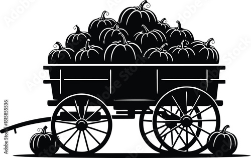 Silhouette of a wagon overflowing with pumpkins and gourds