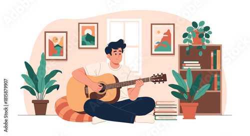 Young man finds joy and relaxation by sitting on the floor of his cozy living room and playing his favorite acoustic guitar.