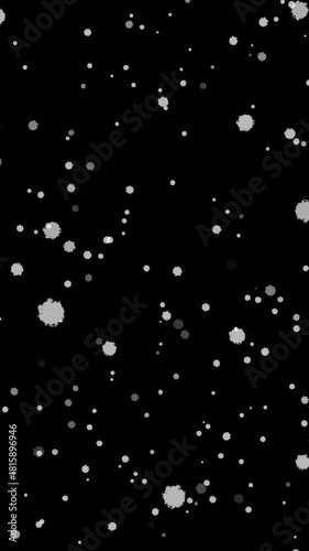 黒背景に雪がゆっくりと降る縦型ループ動画