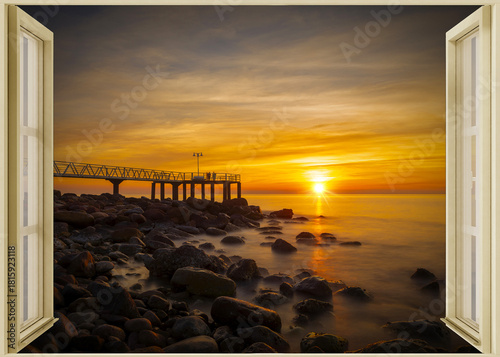 Open window to a seascape at dawn