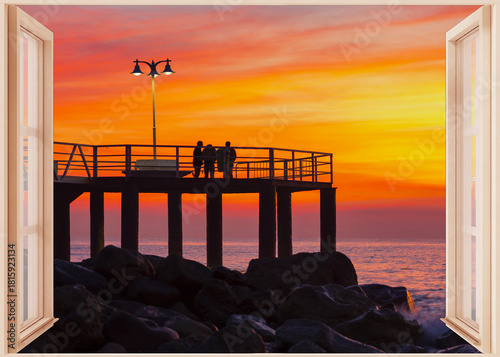 Open window to a seascape at dawn