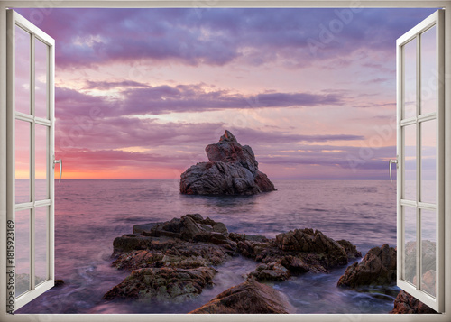 Open window to a seascape at dawn