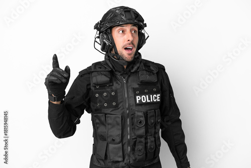 SWAT caucasian man isolated on white background intending to realizes the solution while lifting a finger up