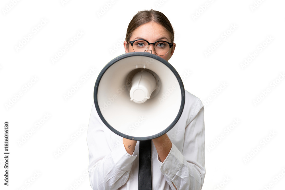 Naklejka premium Young business caucasian woman over isolated background shouting through a megaphone