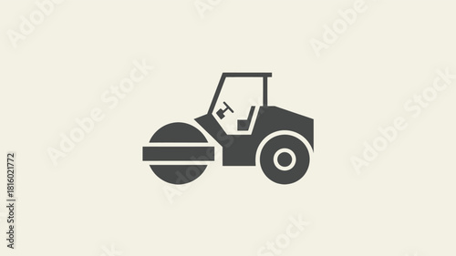 A simple dark gray silhouette of a road roller machine used for compacting surfaces on a light beige background silhouette