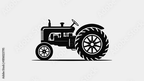 Classic vintage tractor silhouette depicting agricultural heritage and rural farming machinery silhouette