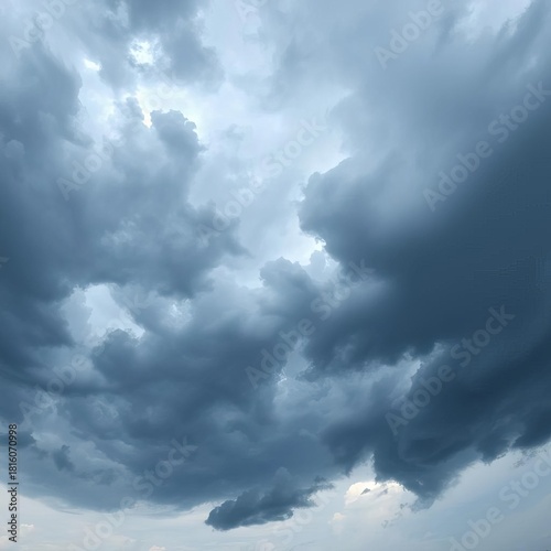 Panorama of dense, thick storm clouds in a dramatic overcast sky, heralding the rainy season,  season,  prelude