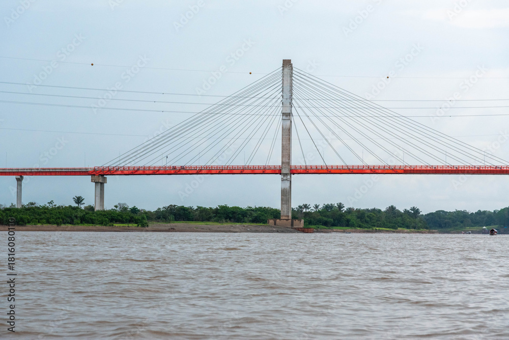 Obraz premium Nanay Bridge Iquitos Peru over Amazon River with Rainbow