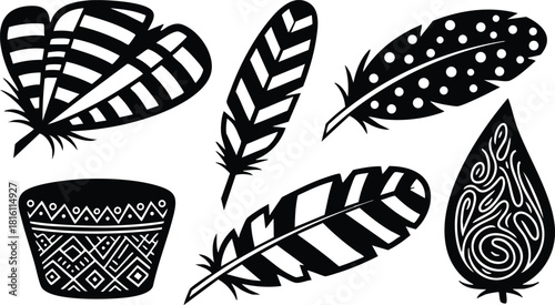 Black feathers and tribal patterns in decorative elements for artistic designs and crafts 