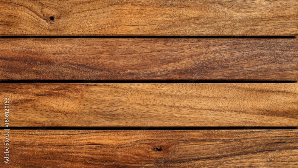 Obraz premium Horizontal wooden slats with a rich brown hue and distinctive grain patterns, forming a natural, textured background or surface.