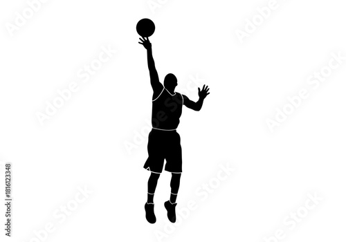 Silhouette of basketball player jumping with ball in hand