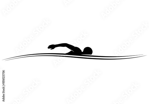 Silhouette of swimmer in motion over water waves