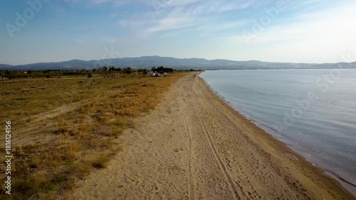 Drone Shot Following the Coastline of a Wild Sandy Beach, Greece