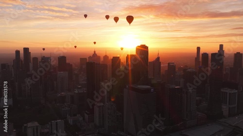 Cinematic Sunrise View of Melbourne City with Hot Air Balloons