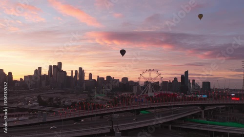 Aerial View of Melbourne Skyline with Hot Air Balloons at Sunrise