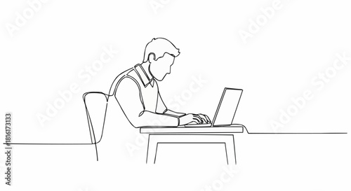 Man working on laptop computer at a desk with a chair.