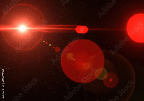Vibrant red lens flare effect with bokeh circles and streaks of light