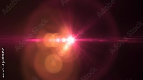 Brilliant magenta light flare with horizontal lens artifacts on dark background