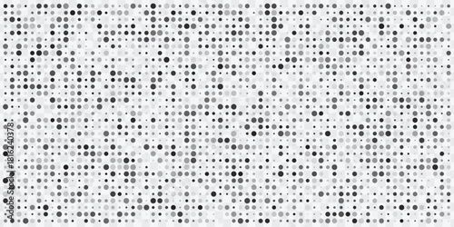 Monochrome halftone background with random dots. Digital texture, data, and abstract pattern.