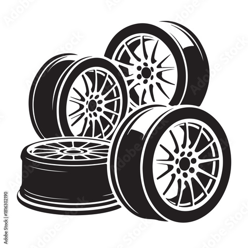 Four black and white car wheels with rims isolated on white background, perfect for automotive design projects