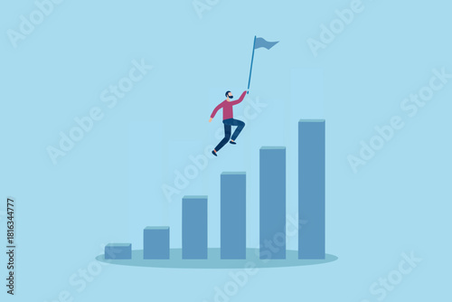 Man jumping on chart to reach goal business success concept