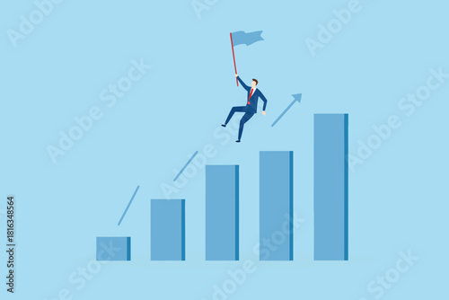 Businessman with flag climbing bar graph to achieve success
