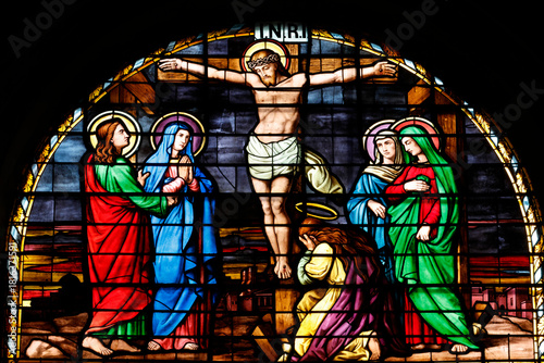 Saint Agatha Church. Stained glass. The crucifixion. Jesus on the cross.  Rumilly. France.