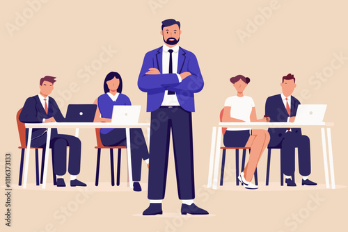 Confident business leader with team working on laptops in background