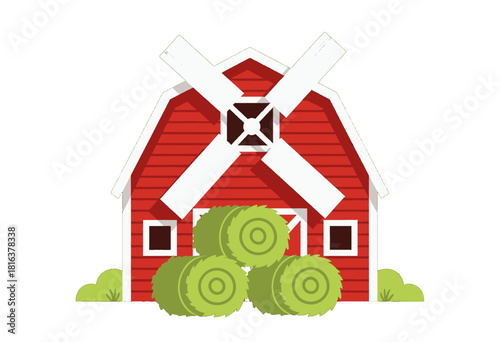 Red barn with rolled hay bales and windmill